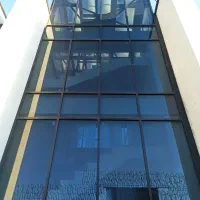 نمای شیشه ای درب و پنجره آلومینیومی