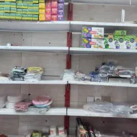 قفسه ی فلزی سفید سوپرمارکتی