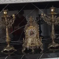 ساعت و شمعدان برنجی عتیقه