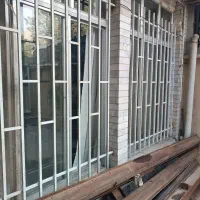 درب  پنجره  آلمینیوم در چوبی باچهارچوب کابینت فلزی