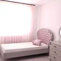 تخت نوجوان و میز ارایش همراه با خوش خواب