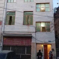 خانه دو طبقه همراه با مغازه