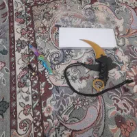 چاقو کارامبیت و چاقو برونینگ کره ای