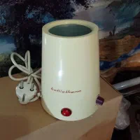 گرمکن شیشه شیر نوزادنو