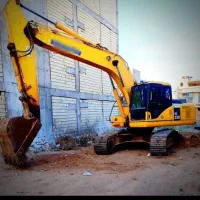 راننده بیل مکانیکی هستم
