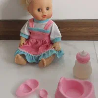 عروسک زیبا با لوازم کامل
