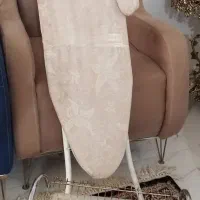 میز اتو و ابچکان کنار سینک