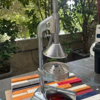 اب میوه گیر دستی