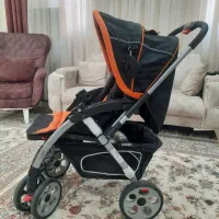 کالسکه ی کودک  دارای قفل چرخ عقب و جلو اسکلت محکم