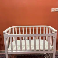 تخت کنار مادر کودک