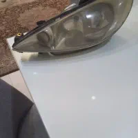 چراغ جلو فابریک پژو ۲۰۶ بدون شکستگی سالم