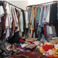 تعداد زیادی مانتو کیف کفش عروسک و ۱۰۰هزار