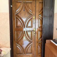 درب ورودی آپارتمان چوب گردو همراه با آکاردئونی