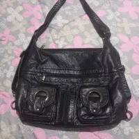 یک کیف زنانه چرم تازه خریدم اصلان استفاده نشده