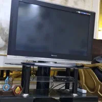 میز تلوزیون چوب و شیشه سالم دوتا کشو