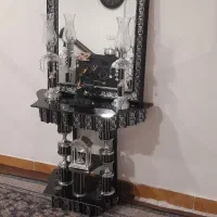 اینه و کنسول با دو تا شمعدان