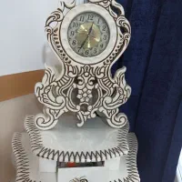 ساعت نونومناسب جهیزیه43000چوبی2تیکه میباشدنو