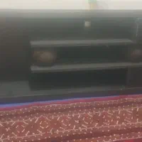 میز تلویزیون چوبی همراه با ساعت ایستاده