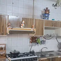 کابینت فلزی کاملا تمیز با سینک و هود