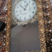 ساعت دیواری طلایی