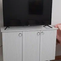 میز تلوزیون یا کنسول ،فرش و میز عسلی