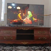 زیر تلویزیونی و آینه و کنسول