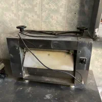 خمیر پهن کن پیتزا