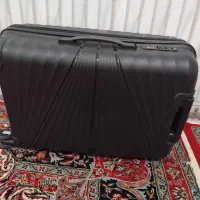 باسلام یک عدد چمدان مسافرتی