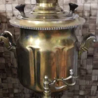 سماور ذغالی برنجی قدیمی دوعدد مجسمه فیل وساعت