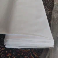 پارچه لباس مردانه .سفید. یک مترونیم عرض بروجرد