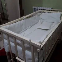 تخت گهواره ای نوزاد