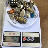 تعدادی اکسسوری فندک و انگشتر و گردنبند در انزلی