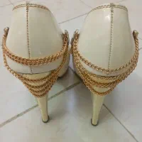 کفش مجلسی|کیف، کفش، کمربند|قم, وادی السلام|دیوار