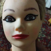 سر عروسک