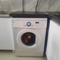 لباسشویی و بخاری گازی
