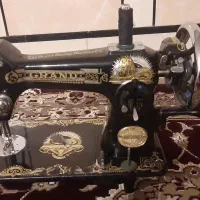 چرخیاطی شیر نشان