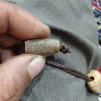 سنگ حکاکی شده احتمالا دارای قدرت یا نقشه مکان