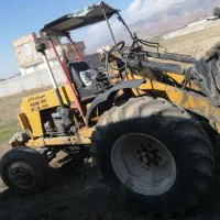 مینی لودر بیل عقب رومانی