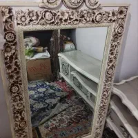 آینه و شمعدان و میز اینه و ساعت
