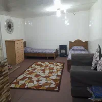 ساختمان اپارتمانی و سویتی دربست  حیاط ۳۰ متردوبر