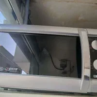 ماکروفر دلونگی سیلور گریلدار درحدنو۳۴لیتری