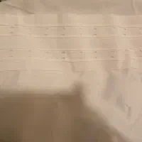 زیر پرده ای تیترون دوخته شده اماده