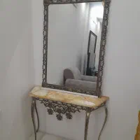 اینه و کنسول و شمعدان