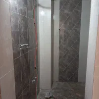 شاگرد ‌کاشی کاری وسنگکاری