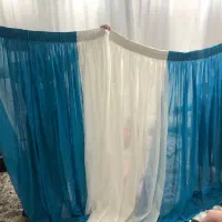 پرده و عروسک و لباس