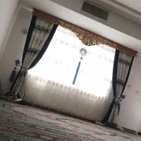 کتیبه پرده طلایی 3متربادوتاوالان پرده سرمه ای