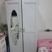 سرویس خواب دخترانه شامل کمد و کتابخانه و میز آرایش