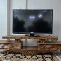 تلوزیون پاناسونیک به همراه میز و DVD و پایه دیواری