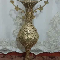 یه عددگلدان فروشی برنزخوش نقش قیمت 9000تومن