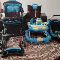 کالسکه کریر و روروک موزیکال همراه با وسایل جانبی